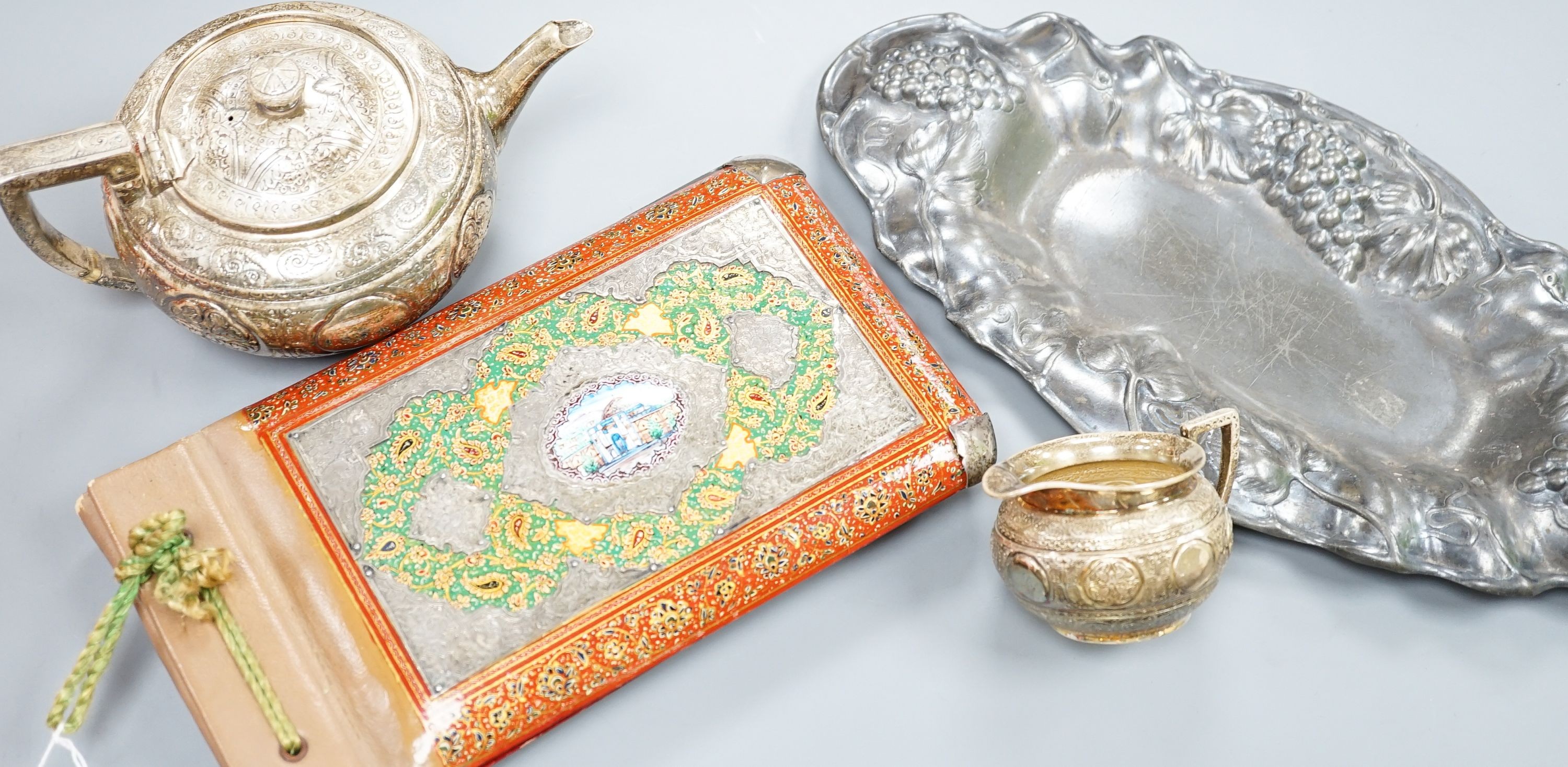 A WMF dish, Islamic white metal mounted photo album and a plated teapot and jug